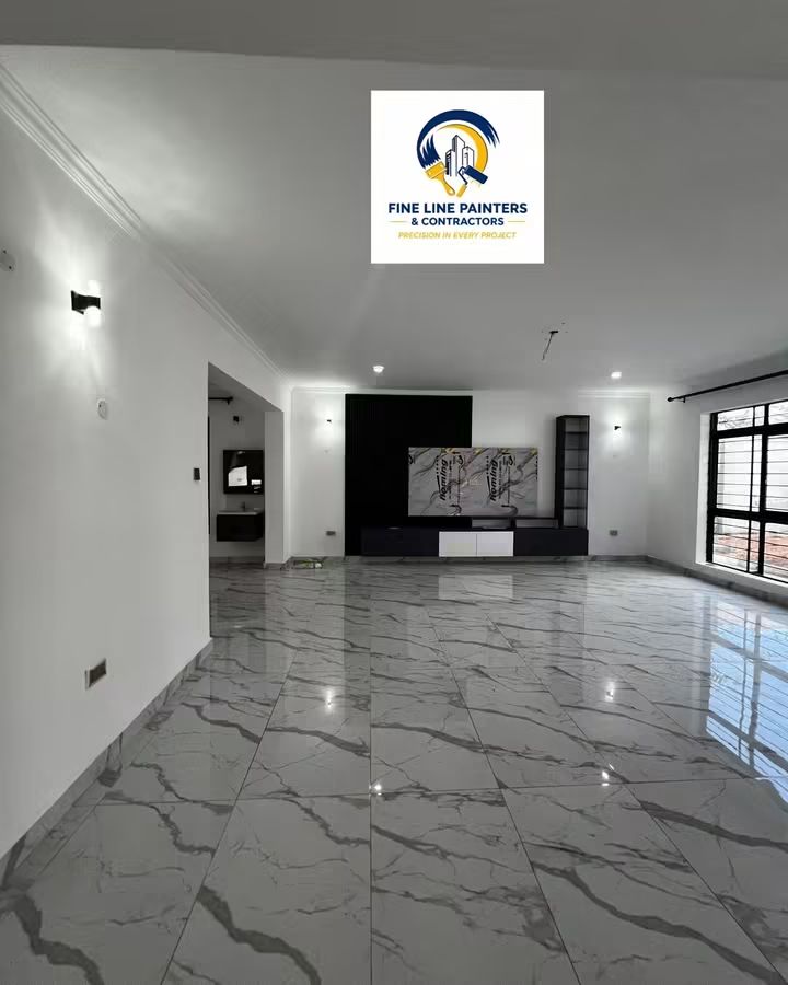 Marble tiled open living area with recessed lighting